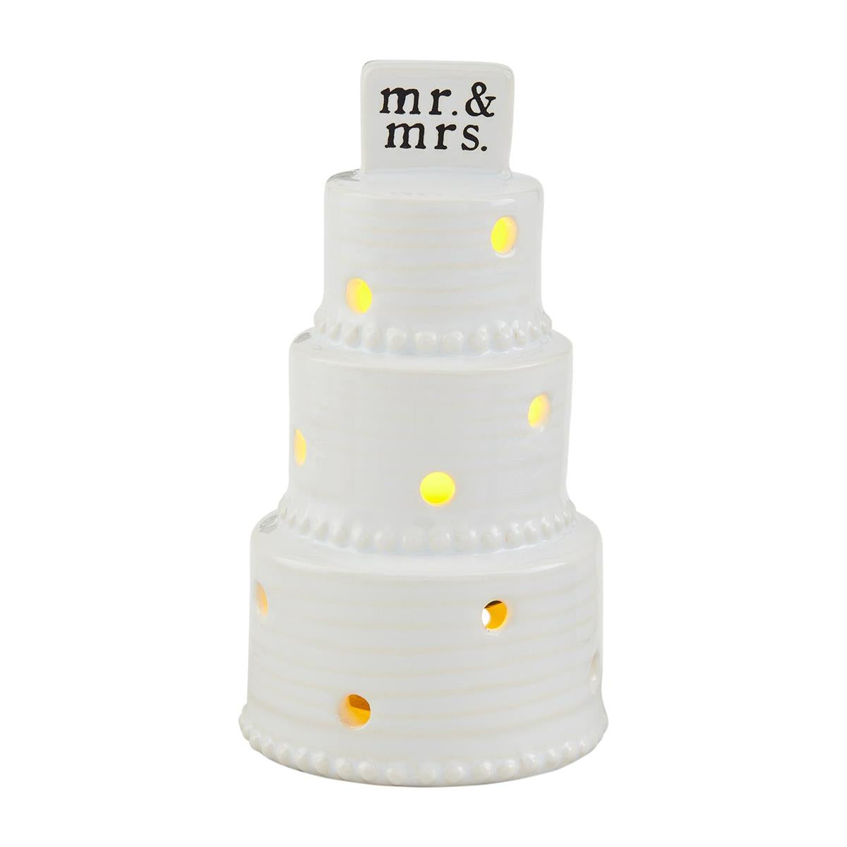 A light up wedding cake sitter that reads "Mr. and Mrs. at the top." From Mud Pie.