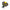A pair of black Pickleball paddles, with a yellow pickleball from Nora Fleming.