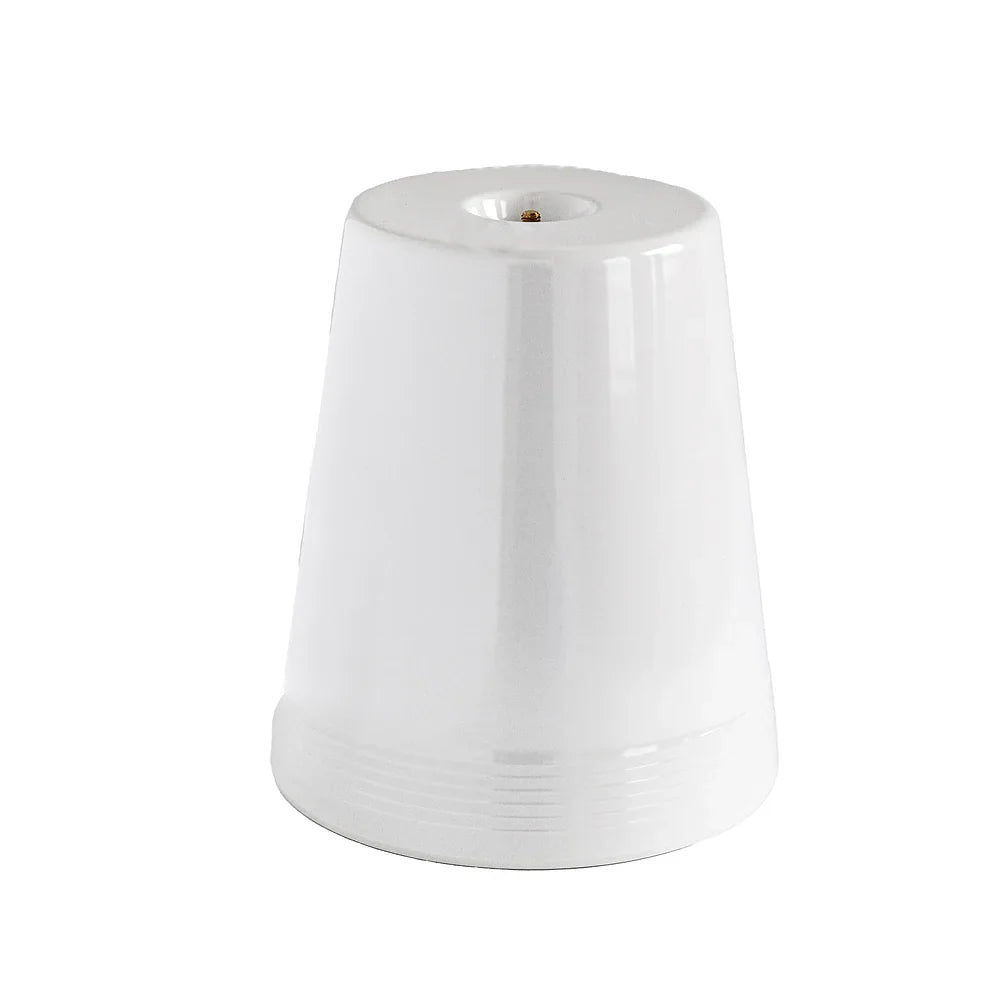 A white colored high riser stand for a kitchen platter. Designed by Nora Fleming out of Melamine.