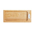 A full view of a maple wood bread board designed by Nora Fleming. With a slot for a Nora Fleming Mini to be displayed. 