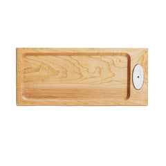 A full view of a maple wood bread board designed by Nora Fleming. With a slot for a Nora Fleming Mini to be displayed. 