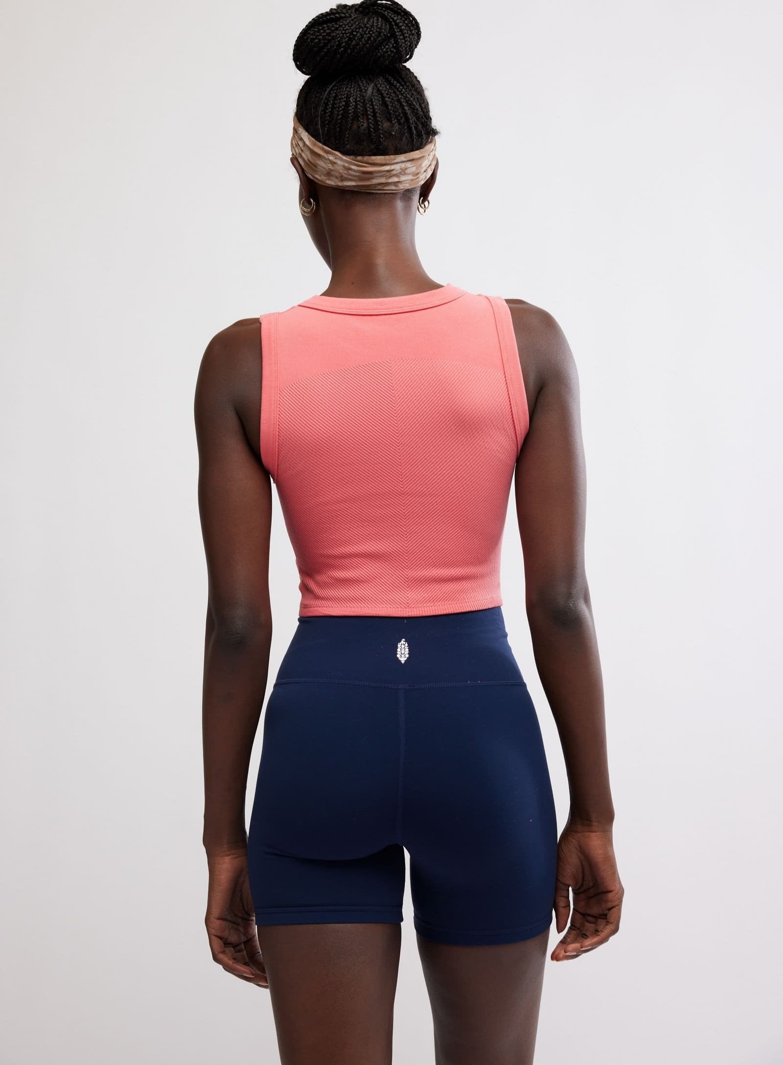 Women's pink athletic tank top from Free People Movement.