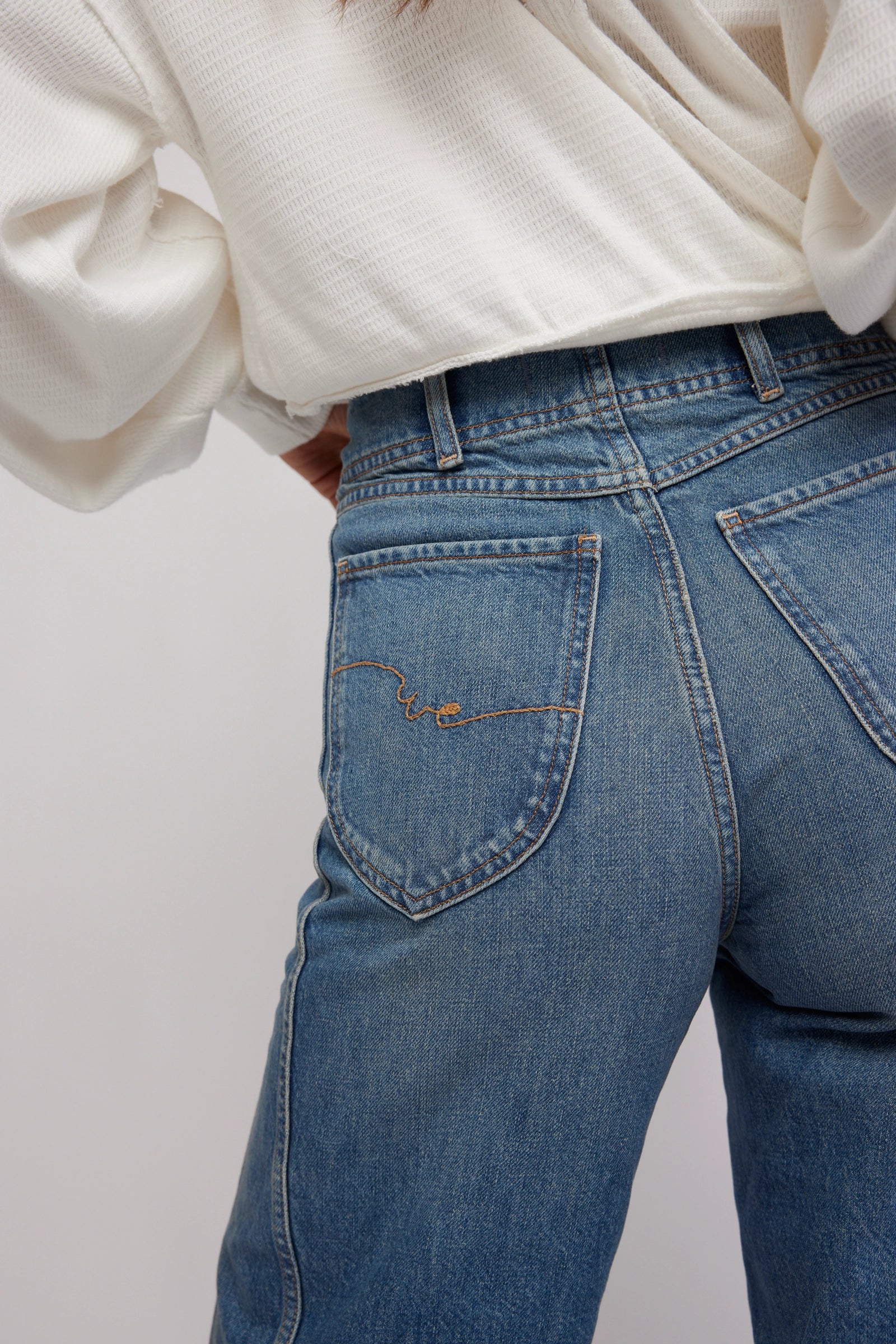 Women's straight leg blue jeans from the brand Free People.