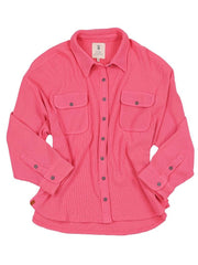 Pink shacket for women with 7 buttons down the front, two chest pockets and a collar top.