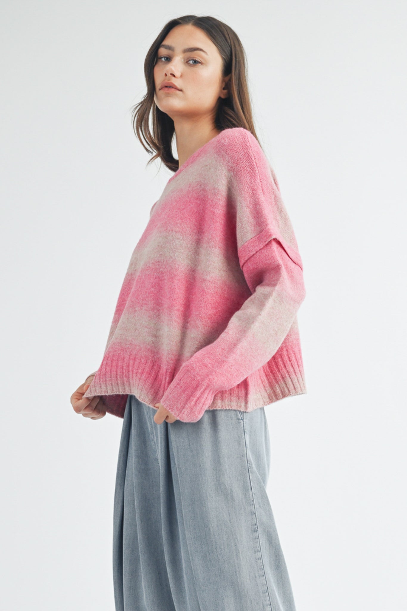 Fuchsia striped women's sweater. 