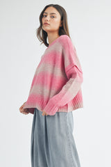 Fuchsia striped women's sweater. 