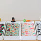 Nora Fleming towel holders displaying cute towels and seasonal Nora Fleming minis