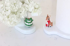 Rudolph displayed next to another Nora Fleming Christmas mini