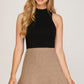 Mocha colored knit mini skirt.