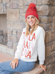 Braided crewneck sweater with "FALALALALALALALA" all down the front. From Simply Southern Brand.