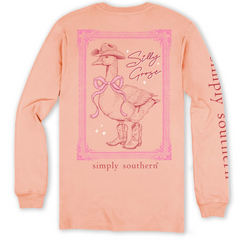 A peach colored long sleeve t-shirt showing a goose in cowboy boots, and  cowboy hat, with a pink red ribbon around its neck. The phrase, "Silly Goose" is just too the right of the goose. A pink frame is around the goose. The Simply Southern Brand logo is at the bottom of the shirt, and on the right sleeve. 