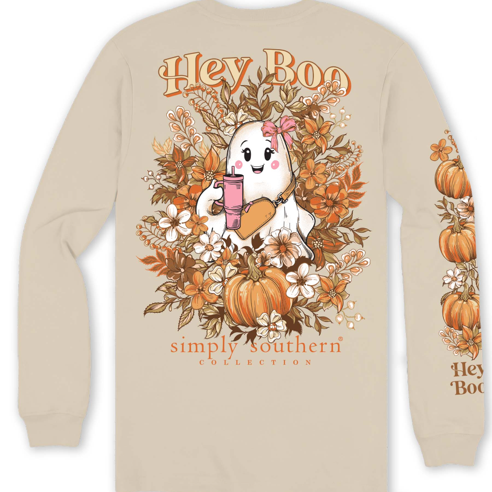 Beige long-sleeve shirt featuring a festive design of a ghost holding a drink amidst autumn flowers and pumpkins, with the text "Hey Boo" from the Simply Southern Brand.