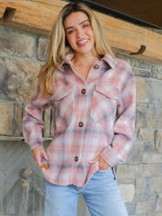 A pink plaid shacket designed by Simply Southern Brand, with 4 buttons down the front, and two chest pockets.