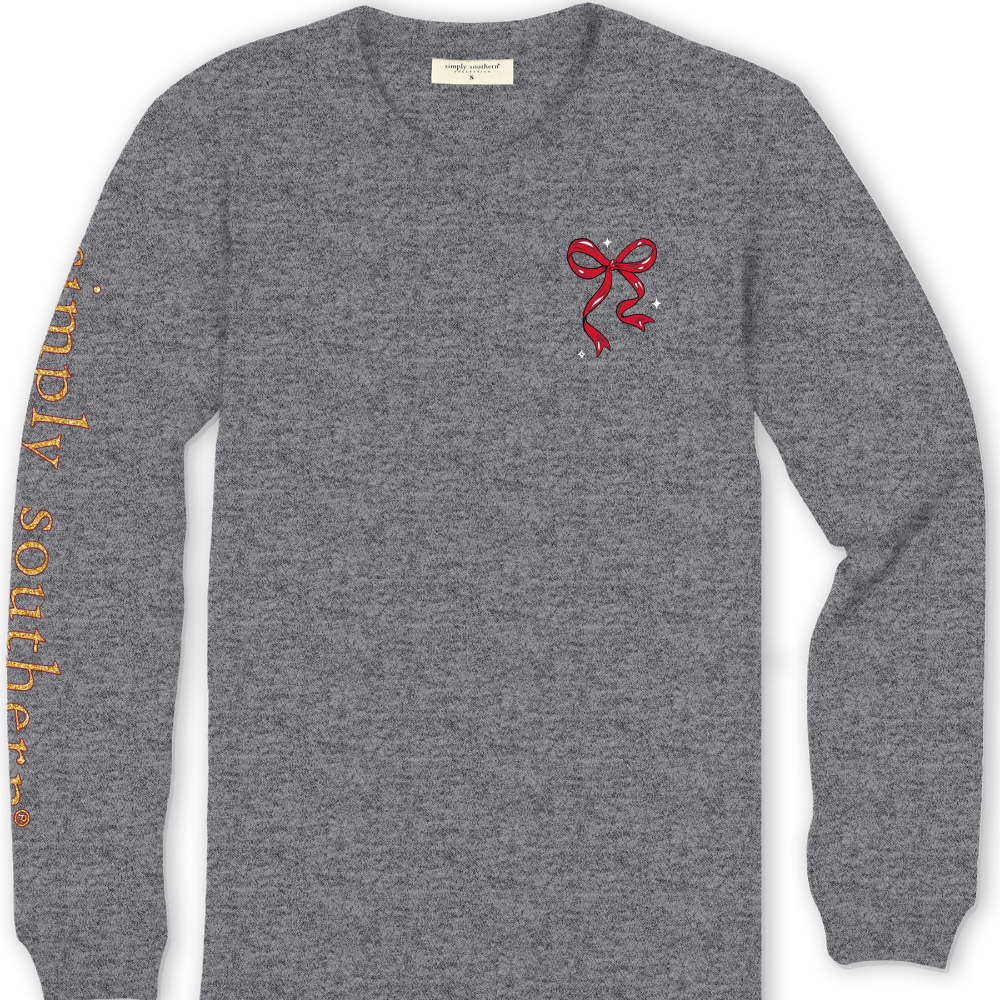 Front of a grey long sleeve t-shirt with a Christmas red ribbon on the chest.