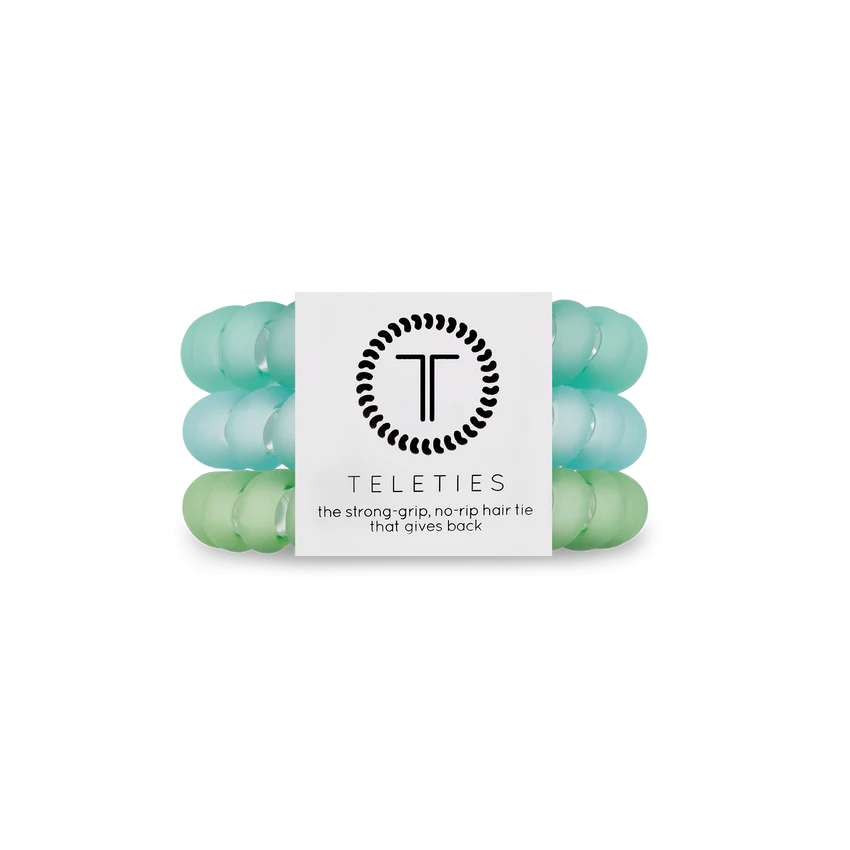 A pack of 3 large size hair ties in the color Turquoise. From TELETIES.