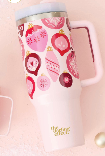 The Darling Effect 40 oz Take Me Everywhere Tumbler in the color pink. Showing pink Christmas ornaments and The Darling Effect logo. 