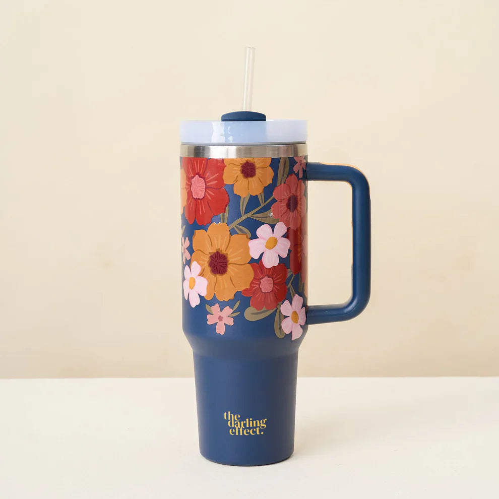 The Darling Effect 40 oz Take Me Everywhere Tumbler in Navy blue, featuring a floral pattern and The Darling Effect logo.