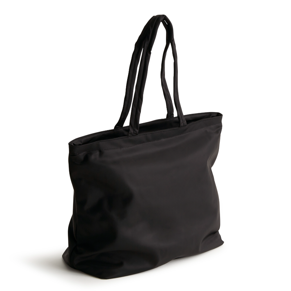 A black colored Vera Bradley original tote bag.