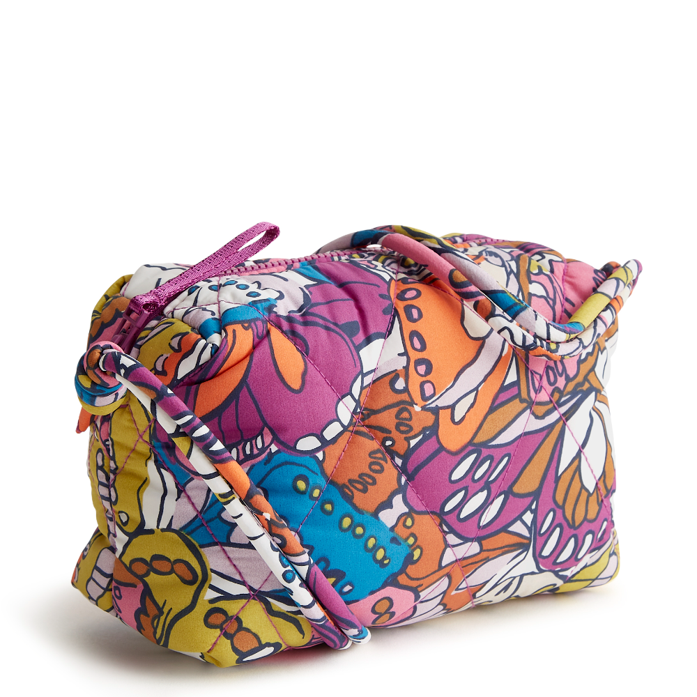 Designed for the minimalist at heart, this compact and versatile bag offers the perfect blend of style and functionality for those who prefer to travel light. Shown in Vera Bradley New Day pattern Flutter.