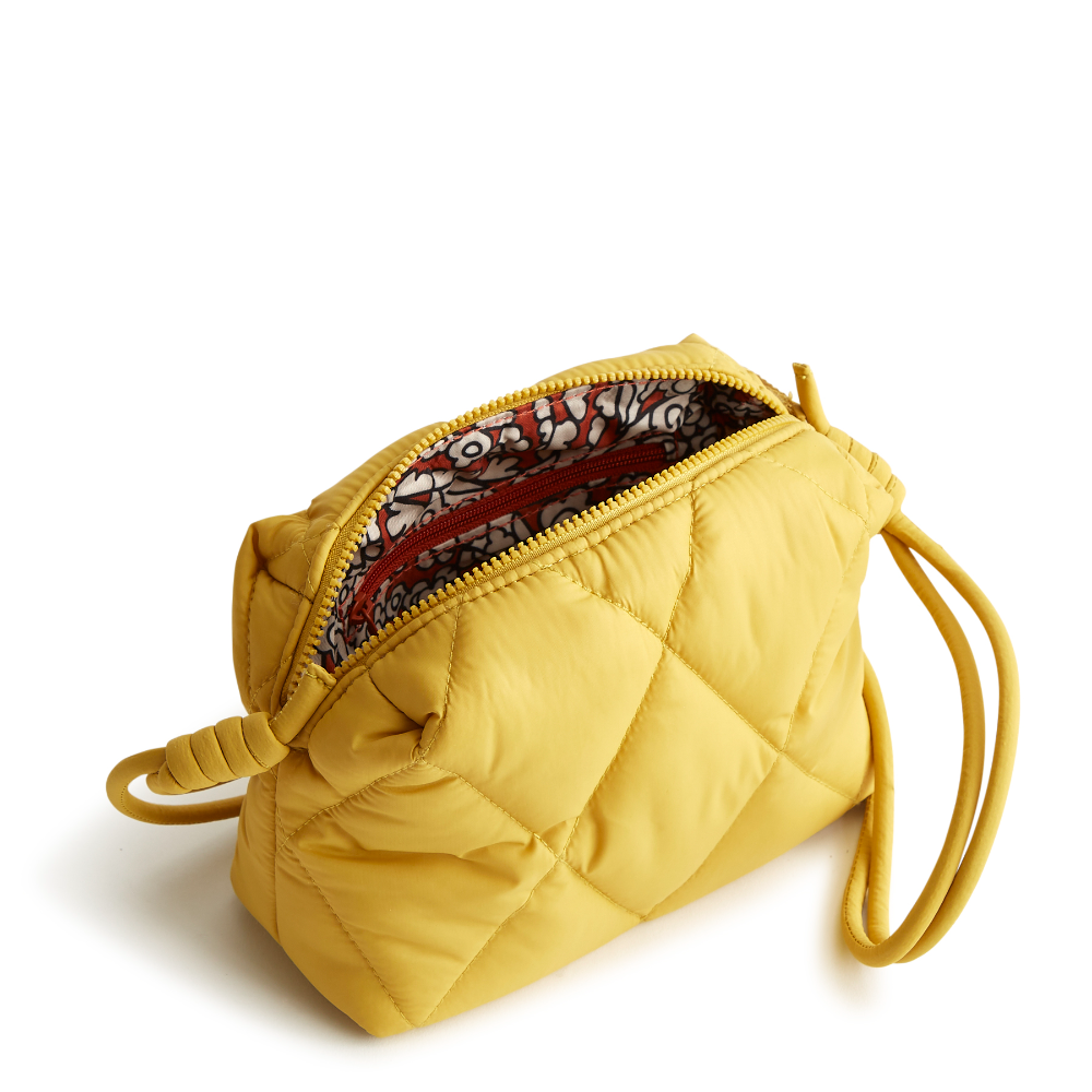 Designed for the minimalist at heart, this compact and versatile bag offers the perfect blend of style and functionality for those who prefer to travel light. Shown in Vera Bradley New Day pattern Golden Olive.