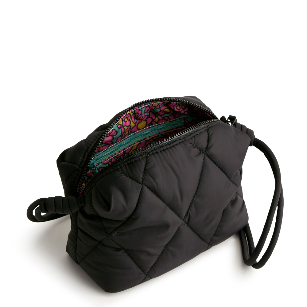 Designed for the minimalist at heart, this compact and versatile bag offers the perfect blend of style and functionality for those who prefer to travel light. Shown in Vera Bradley New Day pattern Moonless Night.