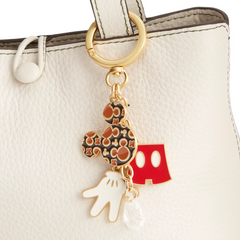 Disney Micke Mouse bag charm of Mickey's head, Mickey's red overalls, and Mickey Mouse hands.