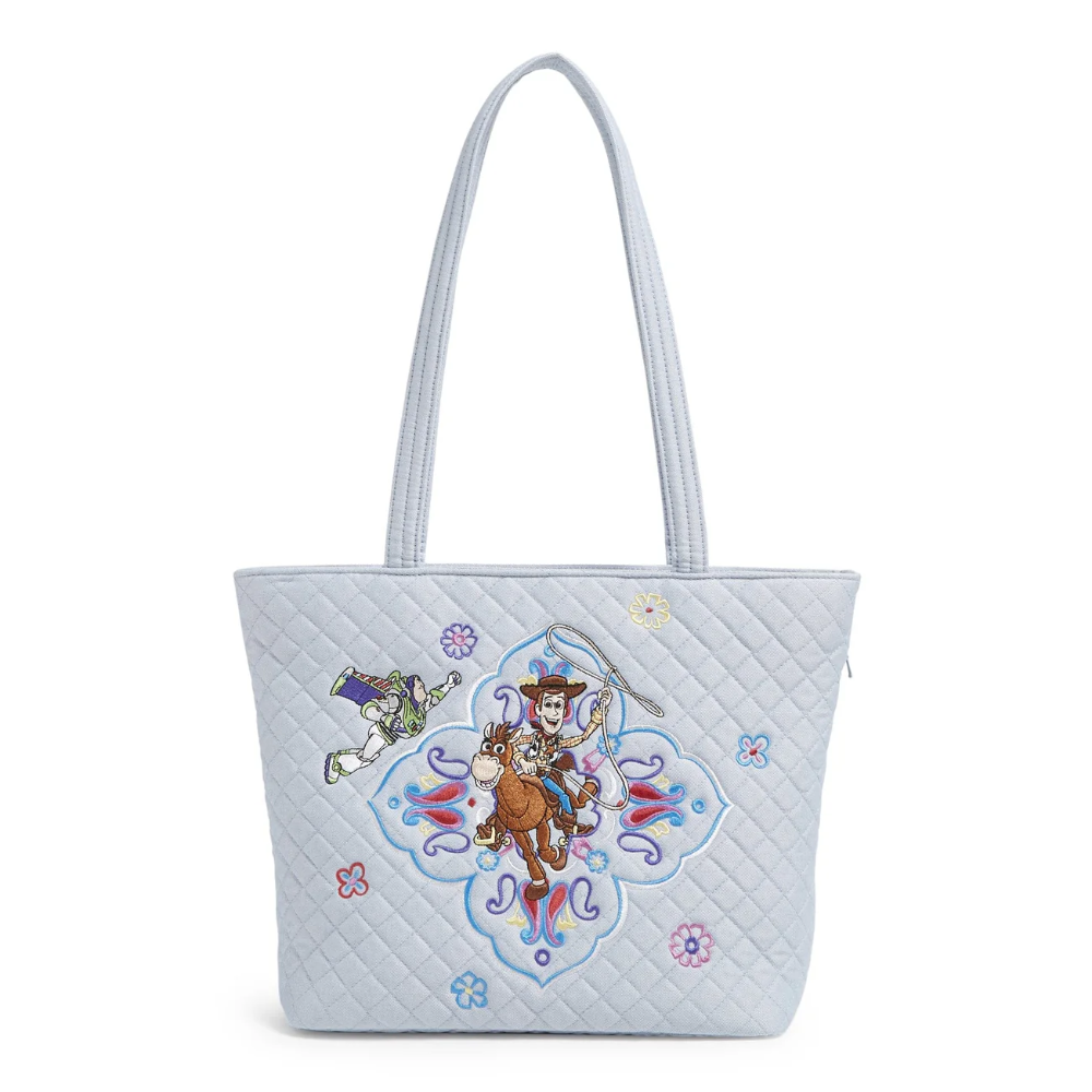 Small size Vera Bradley tote bag with Disney Pixar themed Toy Story characters Woody, Bullseye, and Buzz. 