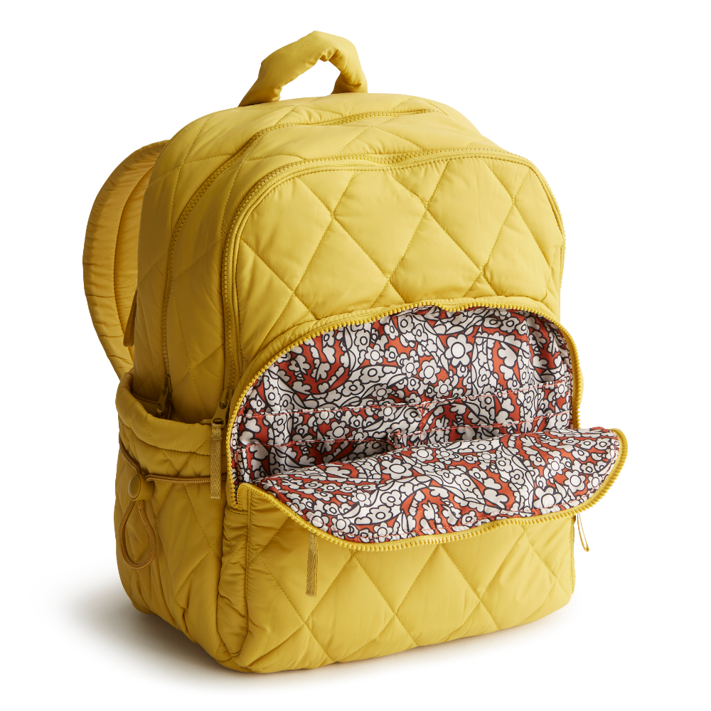 A Nylon fabric large size backpack from Vera Bradley in the color gold. The pattern name is Golden Olive.