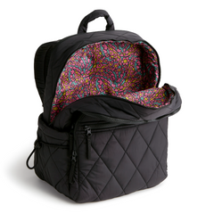 A Nylon fabric large size backpack from Vera Bradley in the color black. The pattern name is Moonless Night.