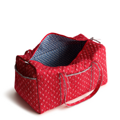 A large size duffel bag in the color red, made from Vera Bradley in Cotton Gabardine fabric.