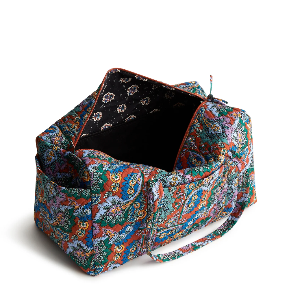 Vera Bradley duffel bag in Flowers + Feathers pattern.