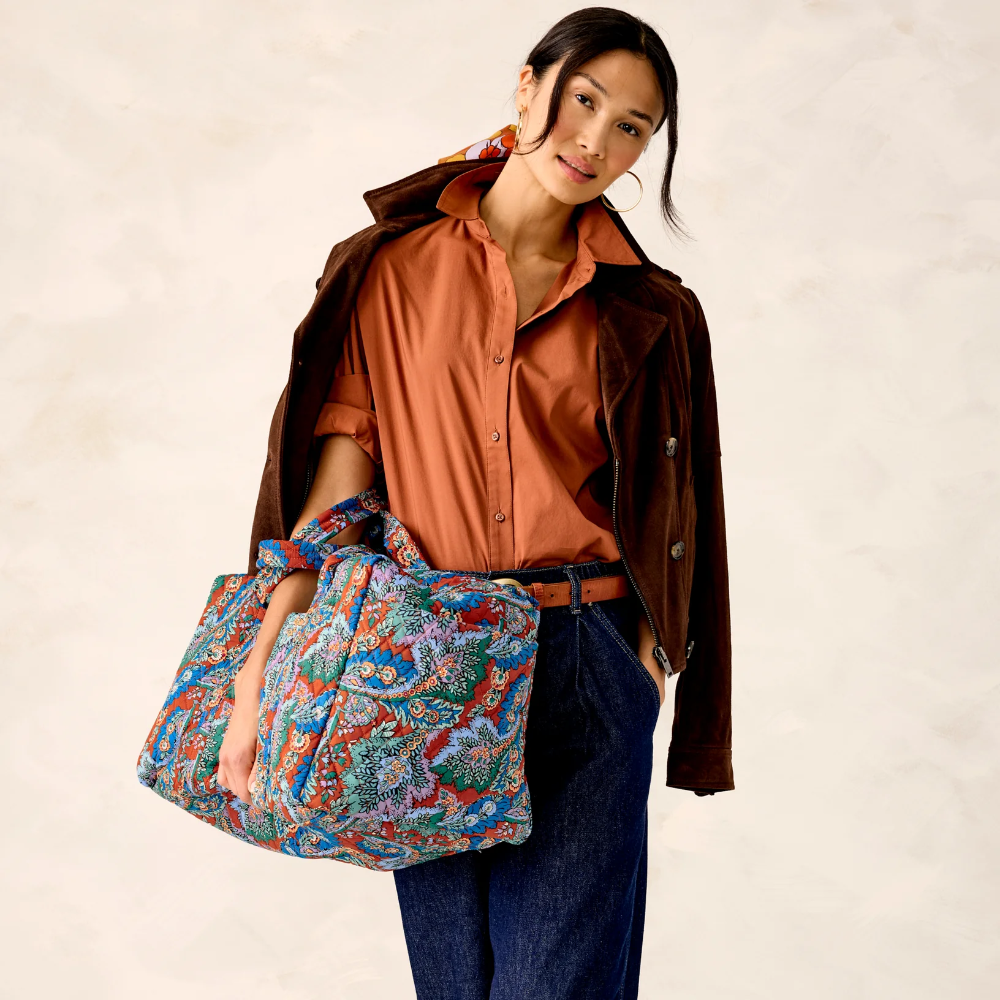 Vera Bradley duffel bag in Flowers + Feathers pattern.