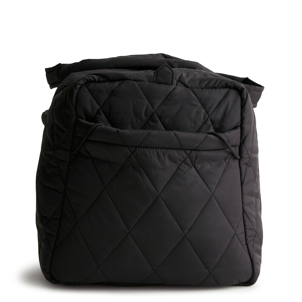 A large duffel bag designed by Vera Bradley in the color black. The bag is designed with nylon fabric.