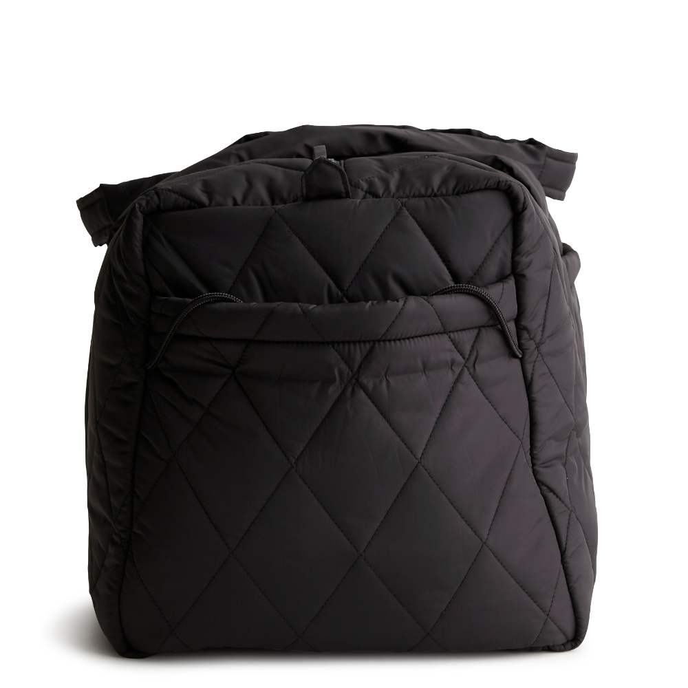 A large duffel bag designed by Vera Bradley in the color black. The bag is designed with nylon fabric.