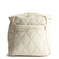 A large duffel bag designed by Vera Bradley in the color white. The bag is designed with nylon fabric.