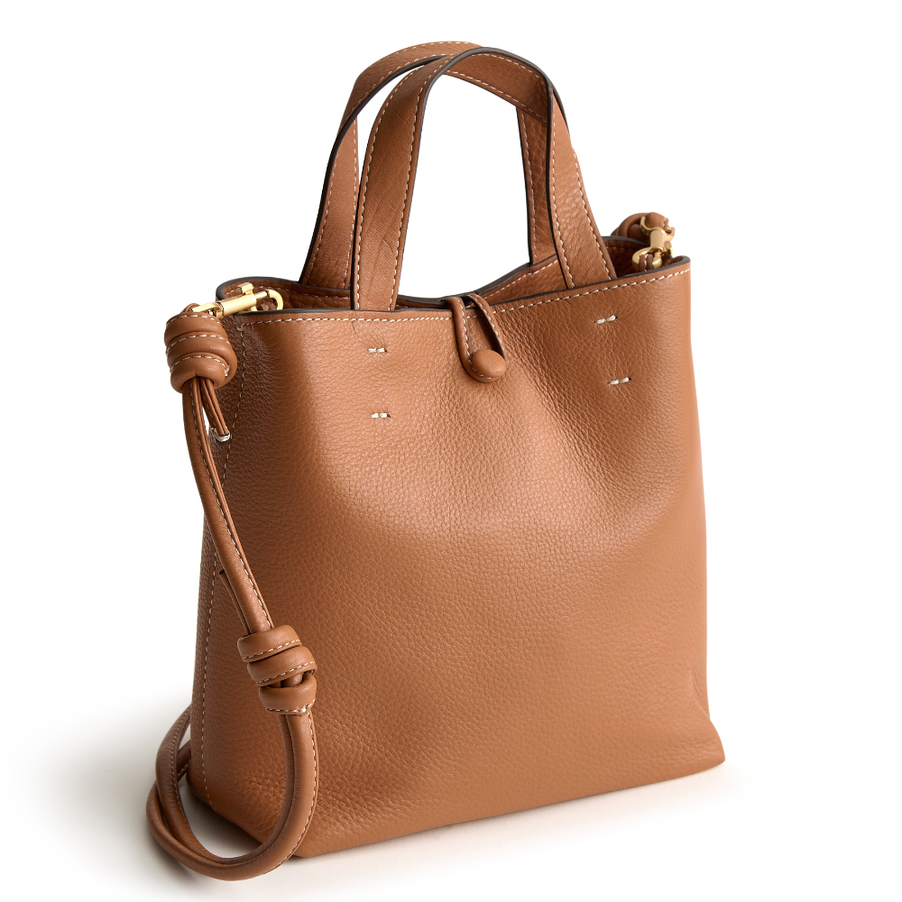 A tan leather mini tote bag from Vera Bradley.