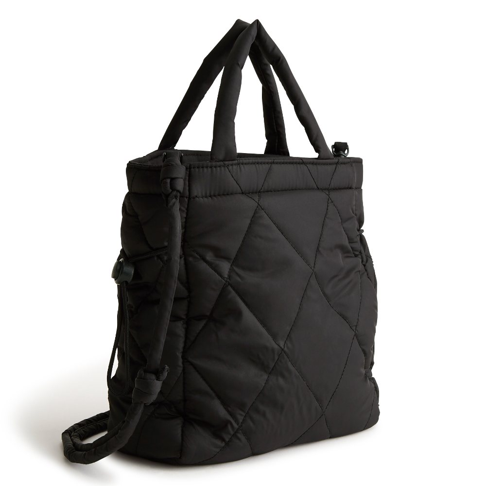 A mini Vera Bradley original tote bag in the pattern Moonless Night.