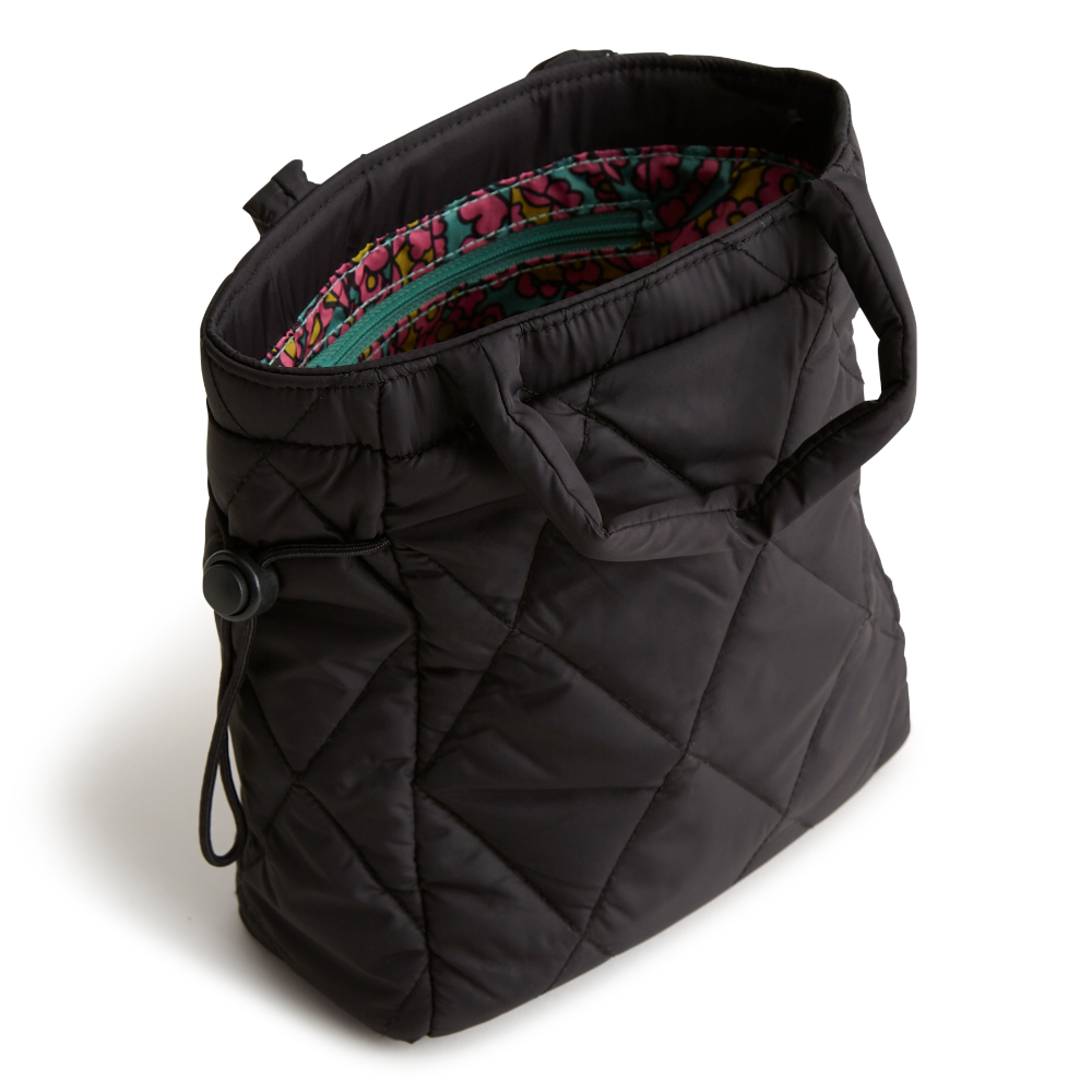 A mini Vera Bradley original tote bag in the pattern Moonless Night.