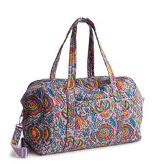 A Vera Bradley Weekender duffel bag in the pattern Marrakesh.