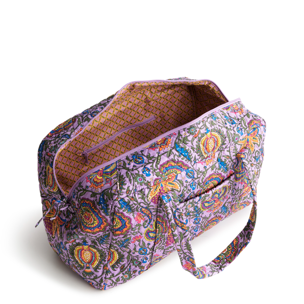 A Vera Bradley Weekender duffel bag in the pattern Marrakesh.