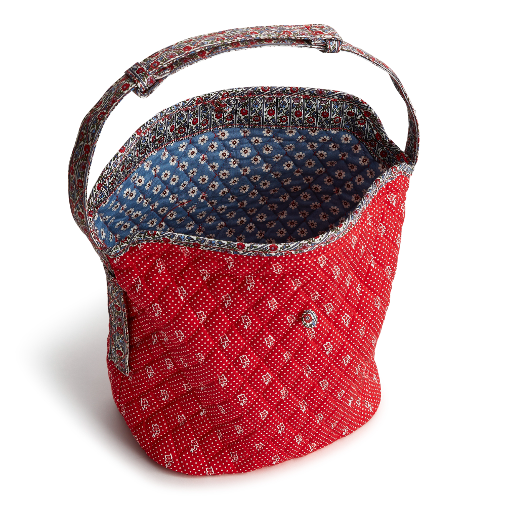 A red shoulder bag from Vera Bradley in the New Day Vera Bradley Dotty Floral Pattern.