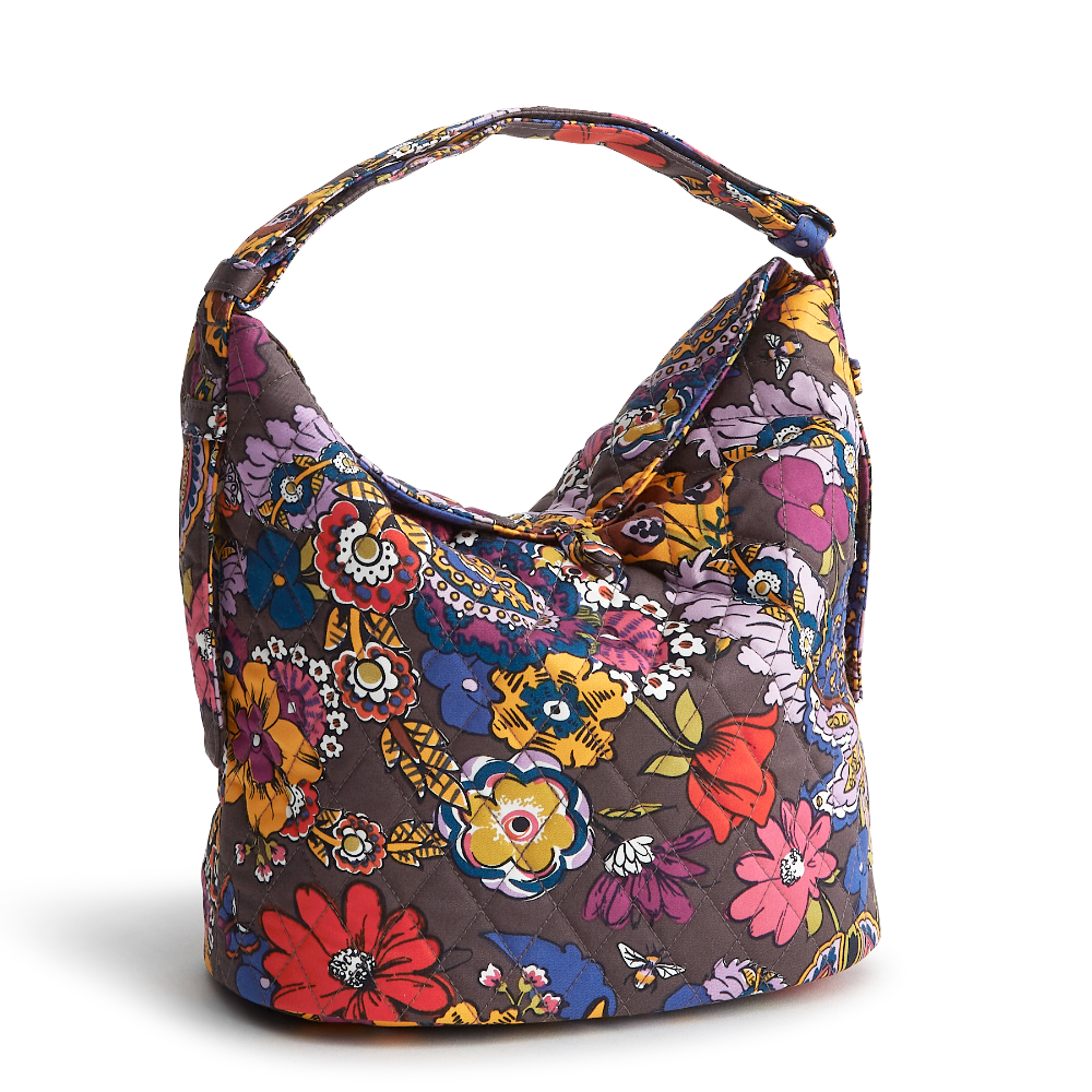 Introducing our Astoria Shoulder Bag, where style meets functionality in the most effortless way. Crafted with a relaxed silhouette and spacious interior, this bag offers the perfect blend of laid-back elegance and practicality for your everyday adventures. This Astoria Shoulder Bag is shown in the Vera New Day pattern Colorful Bouquet.