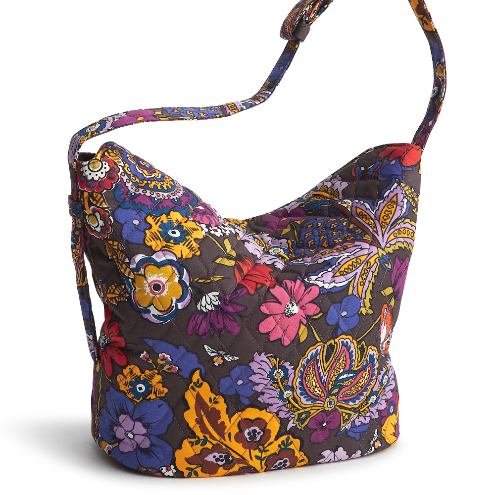 Introducing our Astoria Shoulder Bag, where style meets functionality in the most effortless way. Crafted with a relaxed silhouette and spacious interior, this bag offers the perfect blend of laid-back elegance and practicality for your everyday adventures. This Astoria Shoulder Bag is shown in the Vera New Day pattern Colorful Bouquet.