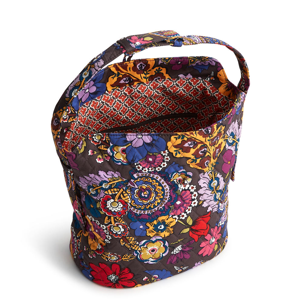 Introducing our Astoria Shoulder Bag, where style meets functionality in the most effortless way. Crafted with a relaxed silhouette and spacious interior, this bag offers the perfect blend of laid-back elegance and practicality for your everyday adventures. This Astoria Shoulder Bag is shown in the Vera New Day pattern Colorful Bouquet.