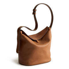 Crafted with a relaxed silhouette and spacious interior, this bag offers the perfect blend of laid-back elegance. This Astoria Shoulder bag is in the Vera New Day Pattern Roasted Pecan.