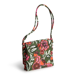 A Vera Bradley New Day Baird Hipster Shoulder Bag in the pattern Bubbly Flowers Green.