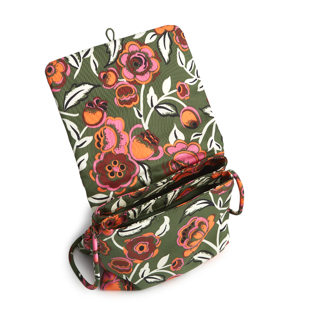 A Vera Bradley New Day Baird Hipster Shoulder Bag in the pattern Bubbly Flowers Green.