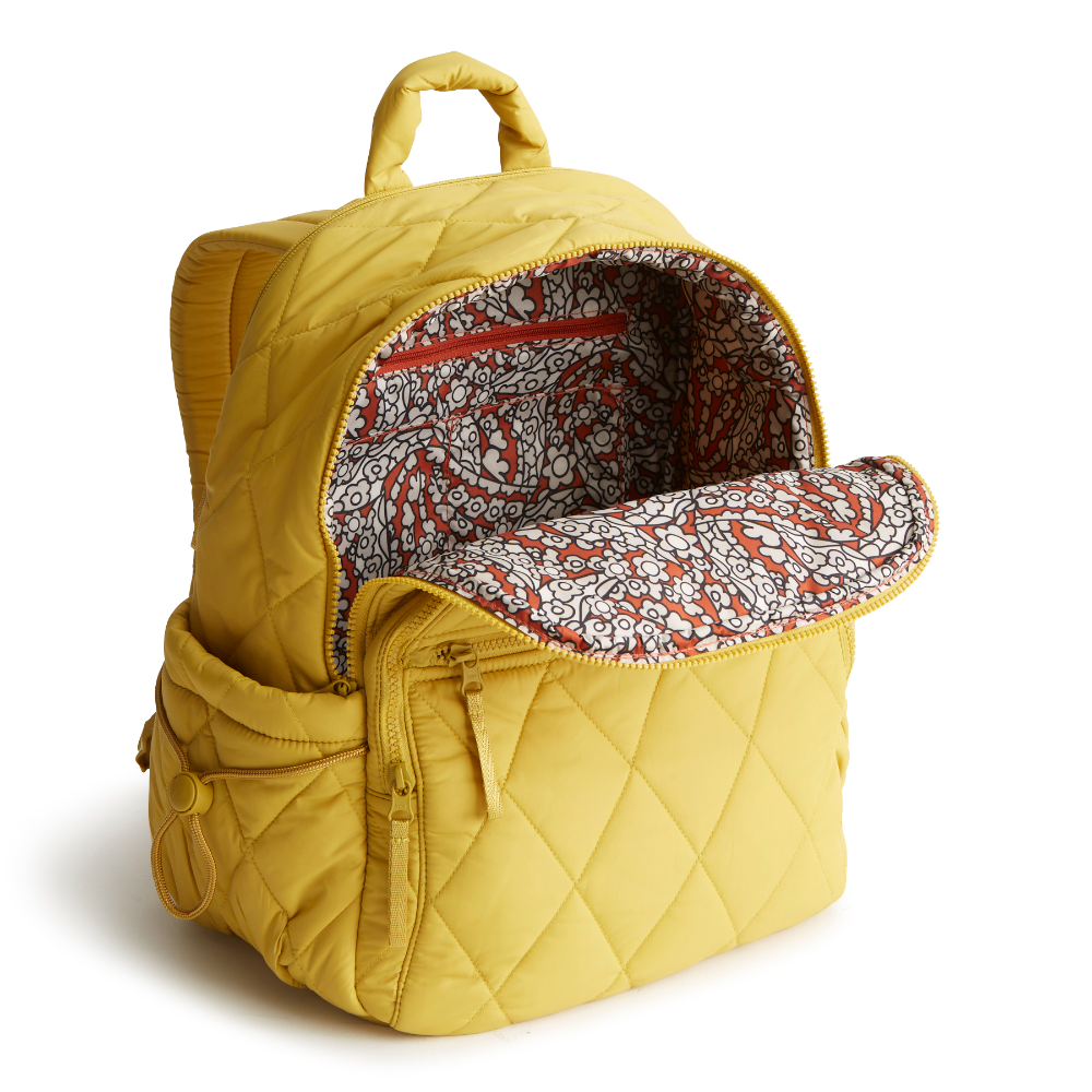 A Vera Bradley Backpack designed from Nylon in the Vera Bradley New Day pattern Golden Olive.