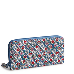 A Vera Bradley New Day wallet designed out of cotton gabardine, in the pattern Bias Mini Vines Ribbons.