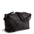 A leather crossbody purse in the color black, designed by Vera Bradley from the Vera Bradley New Day launch. This crossbody is shown in the Vera Bradley pattern Moonless Night.